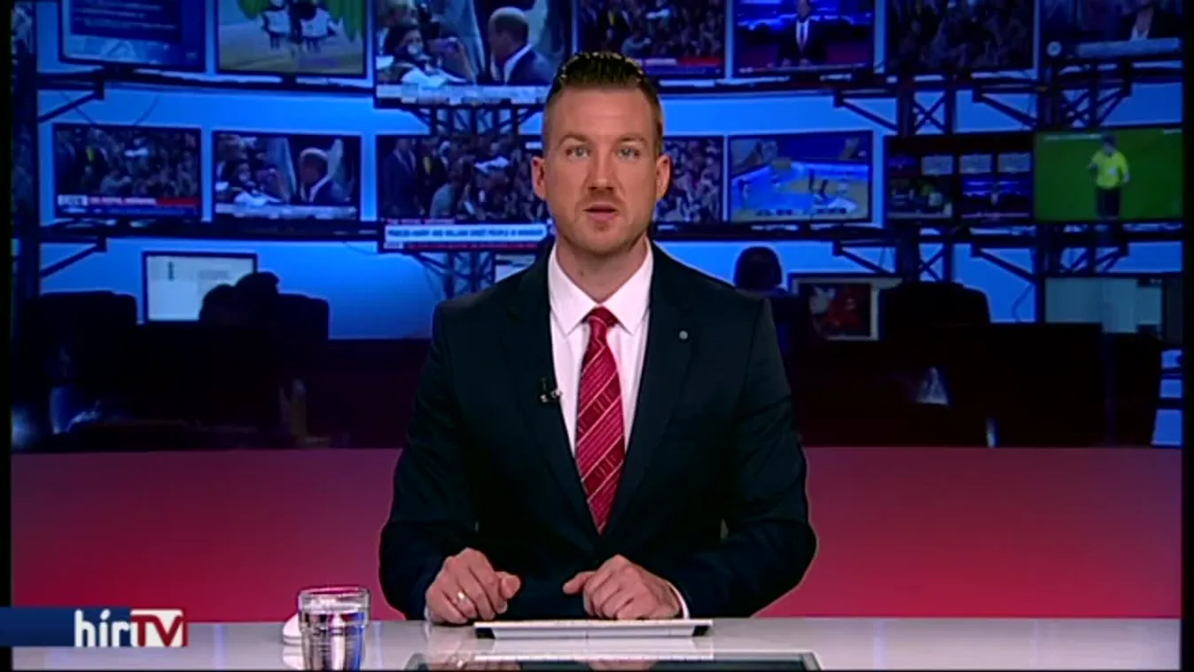 Merkelnek láthatóan jobban tetszett a virág, mint a kutya