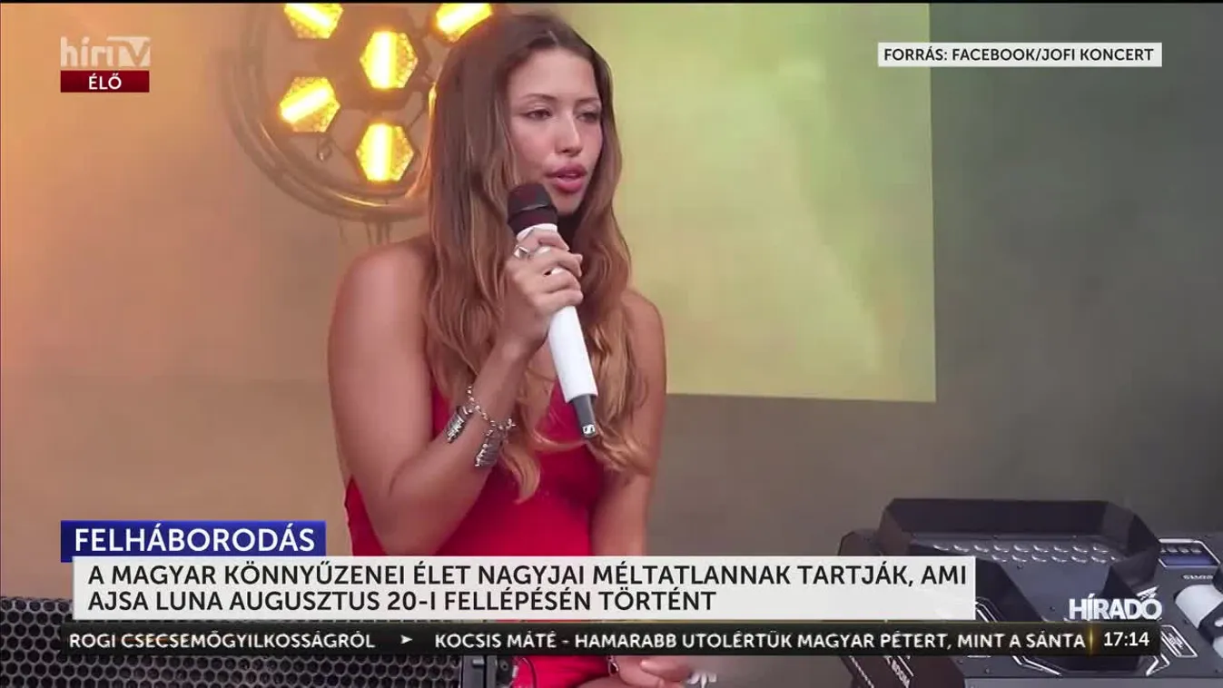 	Cigarettával a kezében, ülve énekelte a himnuszt