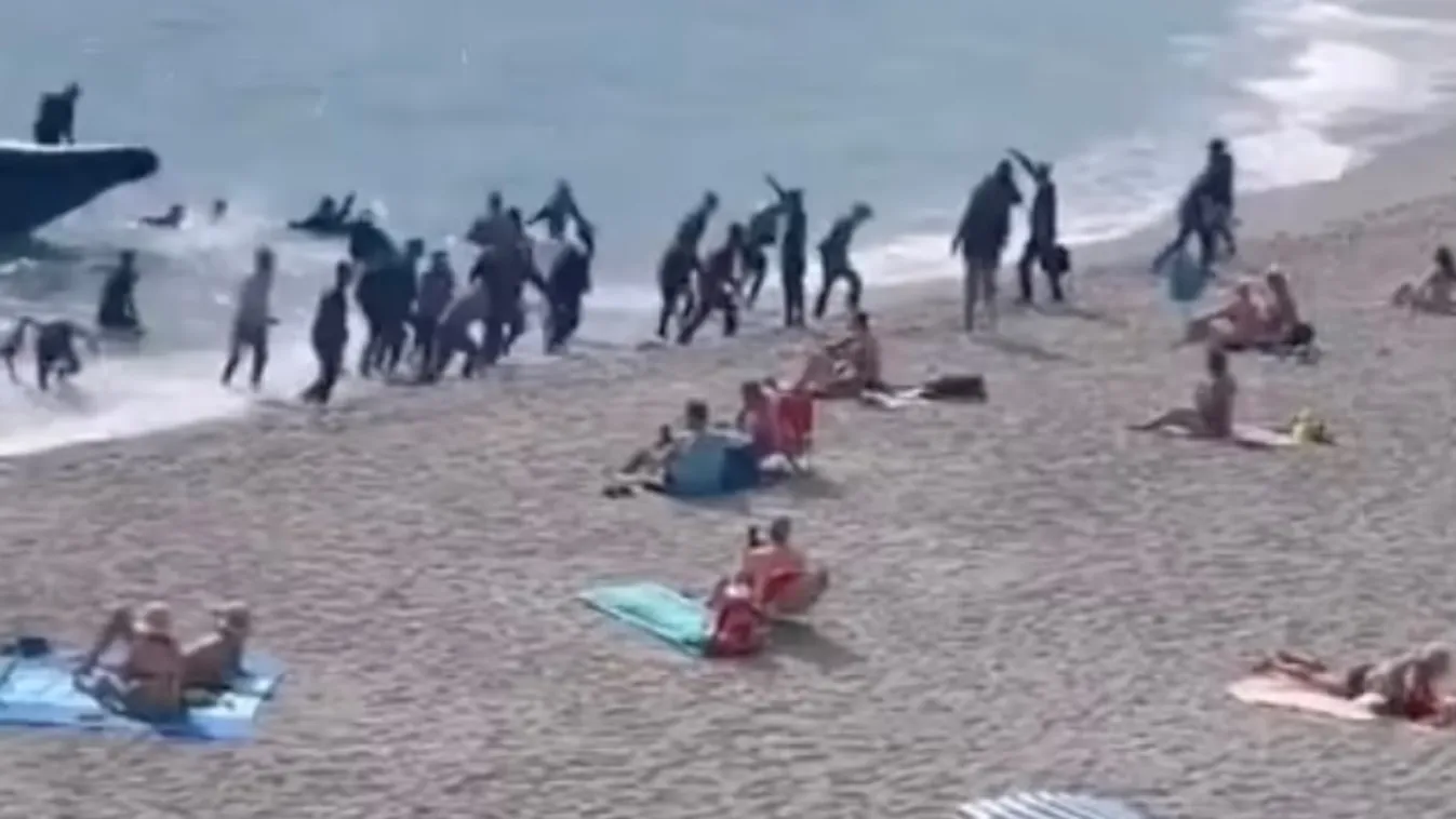 Döbbenet: több tucat migráns ugrott partra egy közkedvelt spanyol strandon + videó