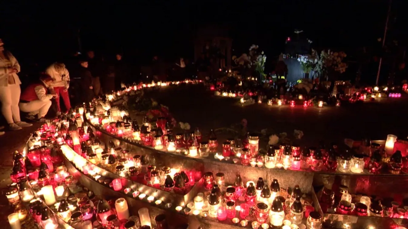 Gyertyafényben és virágokban úsznak a temetők + videó